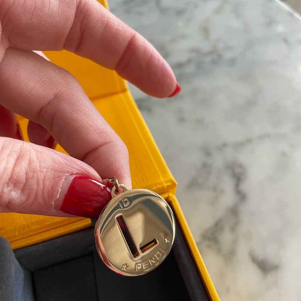 Fendi ID charm. Letter “L”.  1” in size.